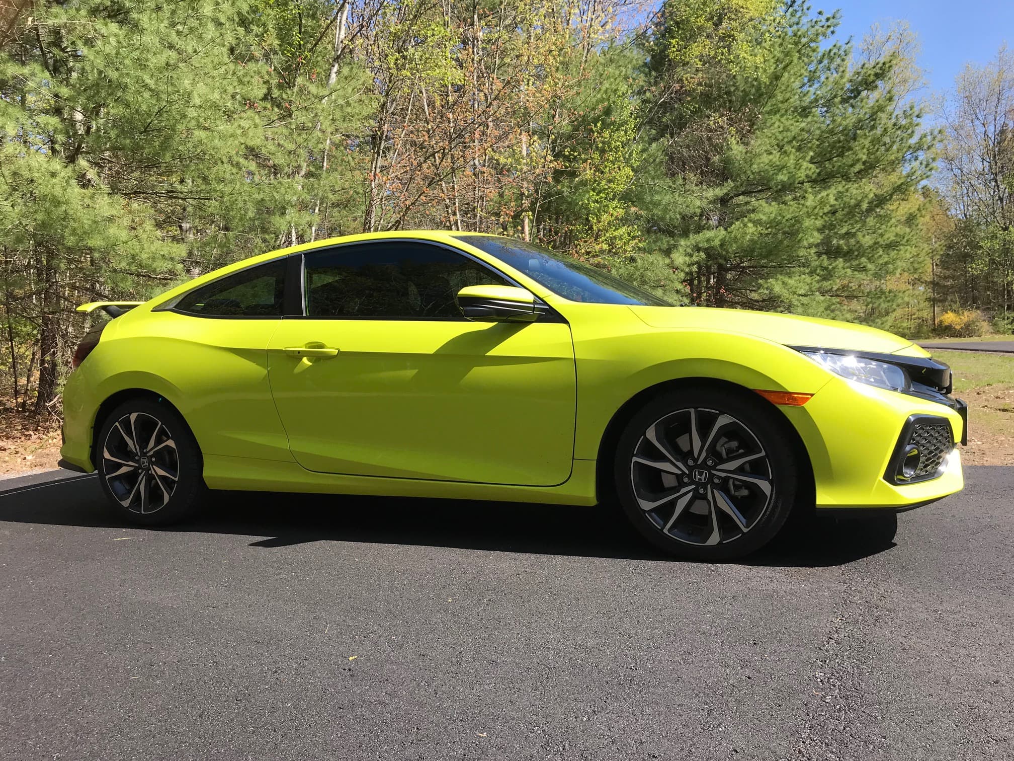 Yellow Honda Civic with professional window tint by Portland Tint in Southern Maine